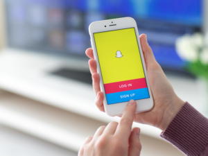 Open Snapchat on your smartphone and log in to your account.